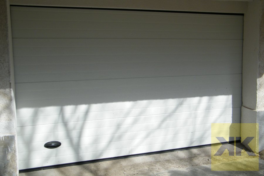 DITEC szekcionált garázskapu telepítés Budapest referencia